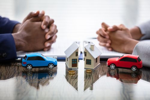 Wife And Husband Splitting House And Car During Divorce Process